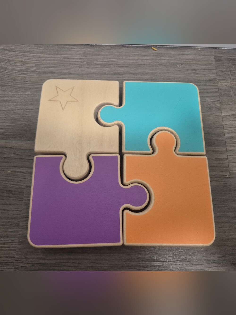 Lovevery Chunky Wooden Jigsaw Puzzle featuring reversible pastelpieces.